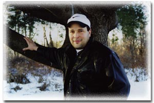 tim against tree